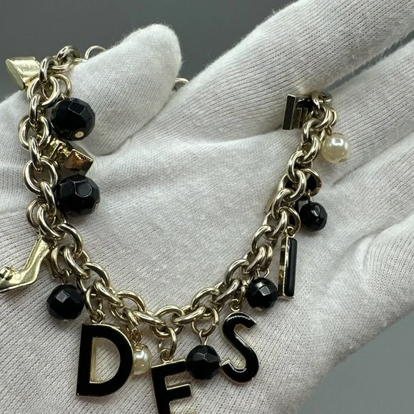 Dolce & Gabbana Gold and Black Charm Bracelet - Picture 4 of 5